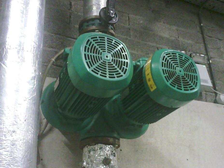 Heat Pump on right running